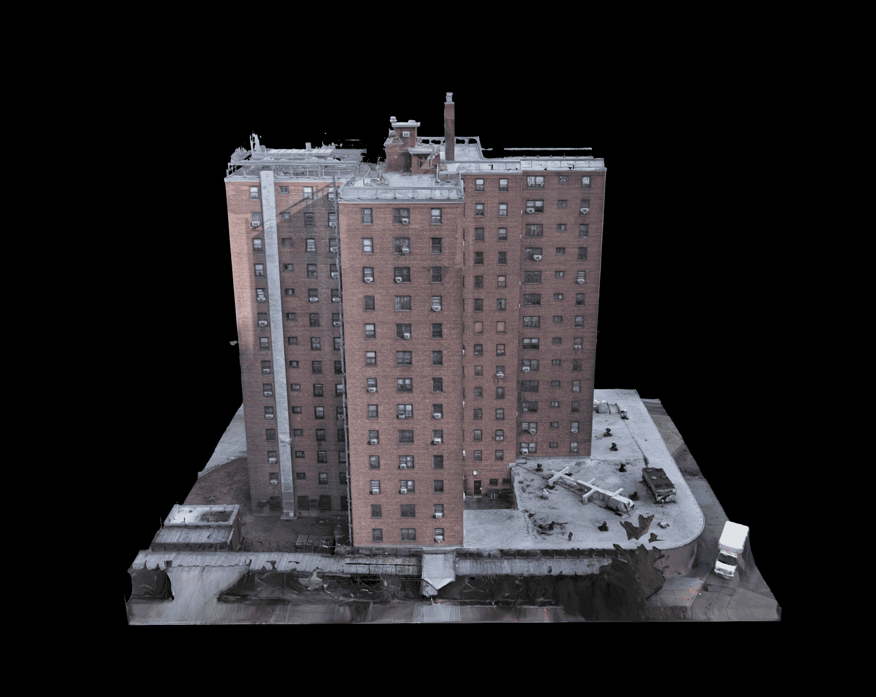 Photogrammetry model of a mid-rise brick residential building, seen from above one corner, with the roof and surrounding ground included